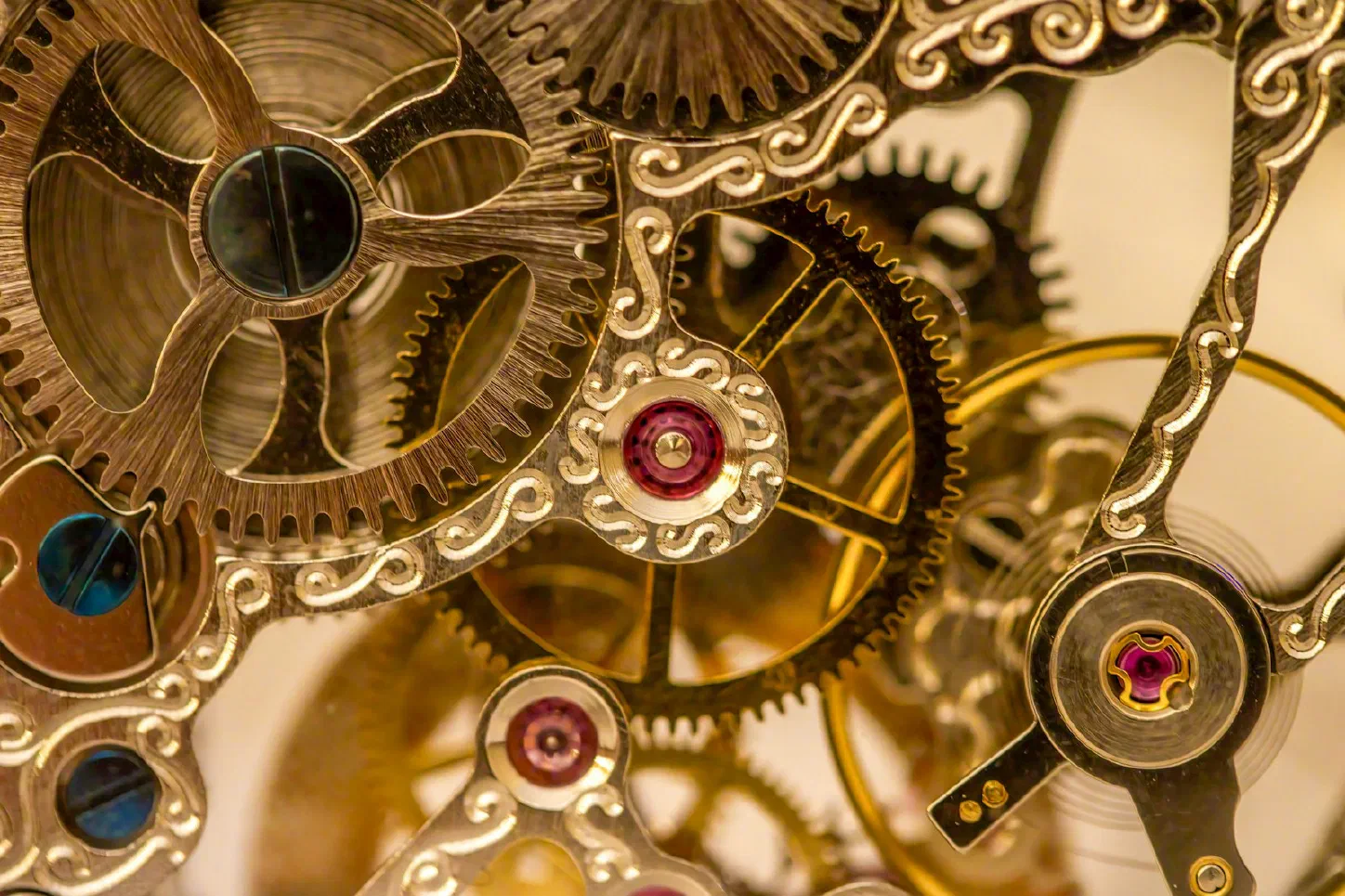 A close-up of a clock with its internal gears and mechanism exposed
